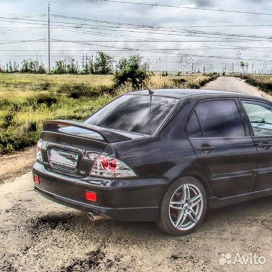 Юбка заднего бампера 2.0 Митцубиси Лансер 9