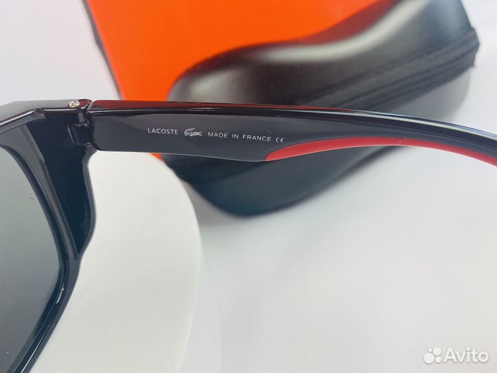Солнцезащитные очки Lacoste