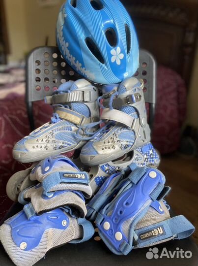 Роликовые коньки