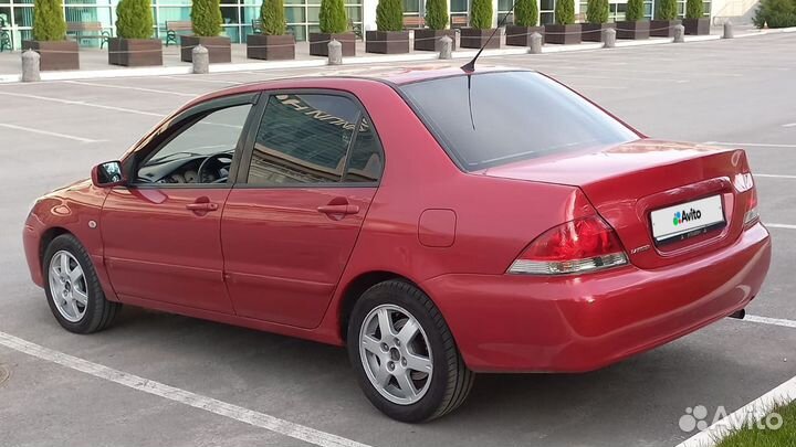 Mitsubishi Lancer 1.6 МТ, 2005, 292 939 км