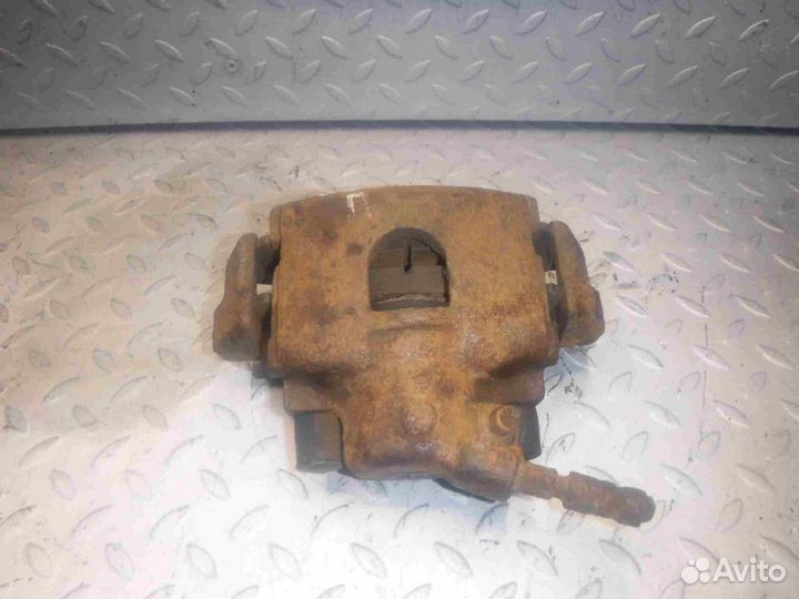 Суппорт тормозной передний правый Ford Fiesta