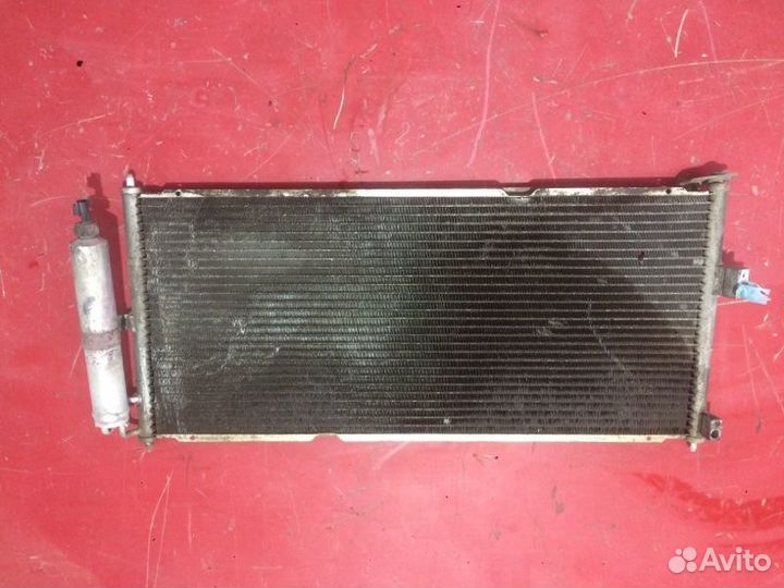 Радиатор кондиционера Nissan Almera N16 хэтчбек