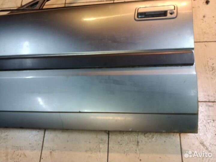 Дверь передняя левая Mazda 323 BG