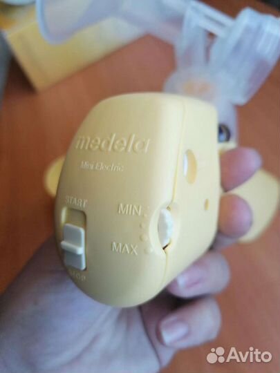 Молокоотсос medela электрический