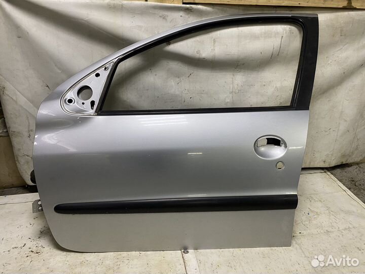 Дверь передняя левая (2008 год ) Peugeot 206