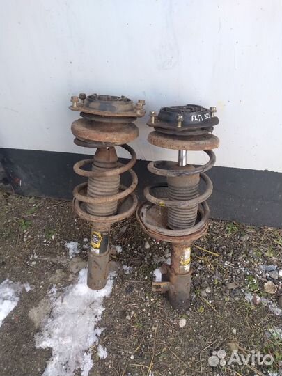 Передние стойки мазда 323ф