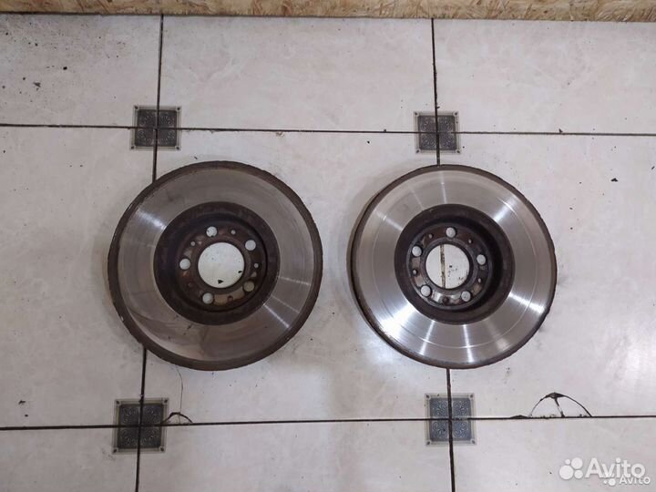 Тормозной диск передний Skoda Rapid