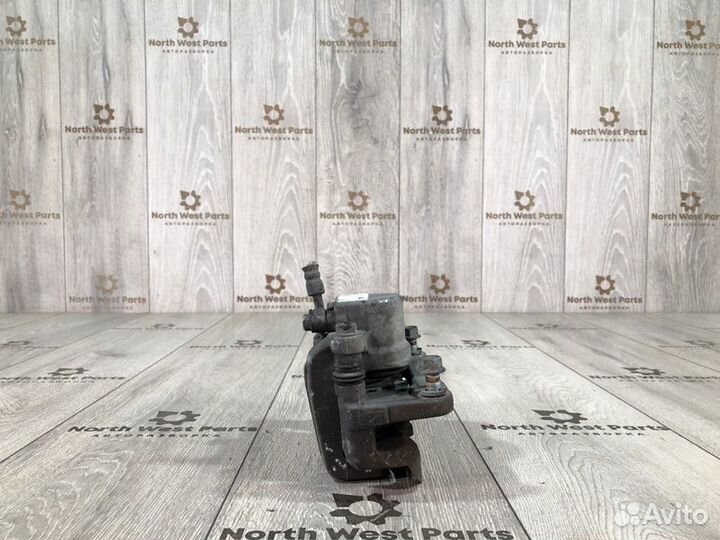 Суппорт задний левый Kia Sorento 2 внедорожник