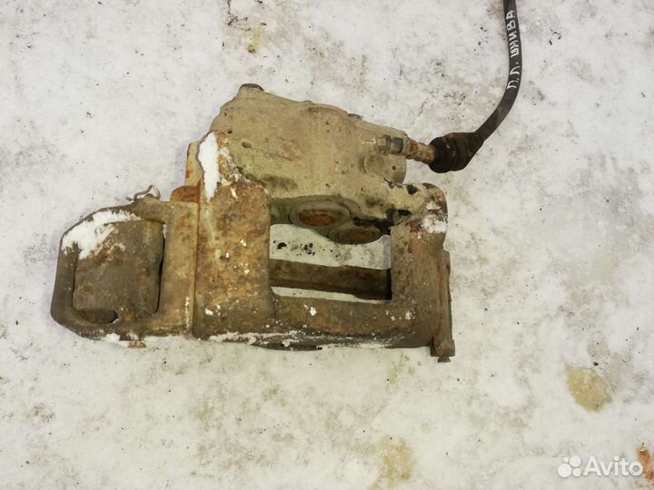 Суппорт тормозной передний Нива Шевроле