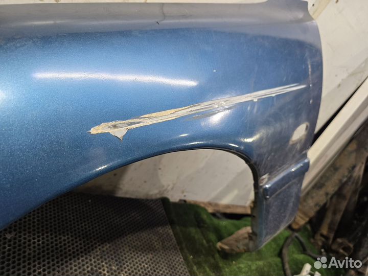 Крыло переднее левое Mazda 626 GE (1991 - 1997)