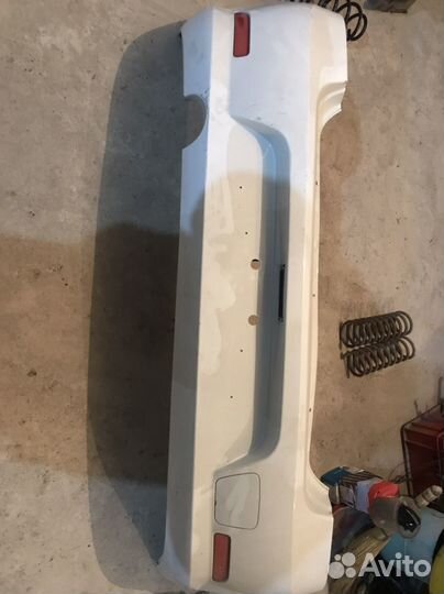 Задний бампер рено логан2011год