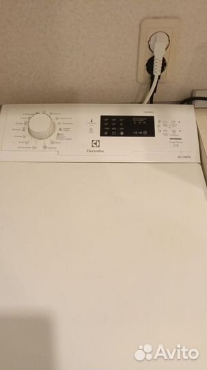 Стиральная машина с вертикальной загрузкой