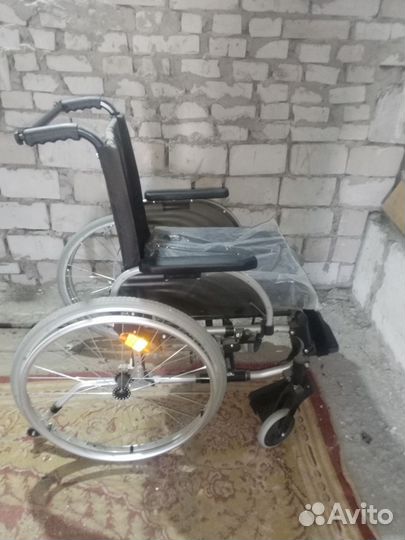 Инвалидная коляска новая
