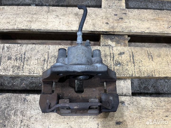 Суппорт тормозной задний левый Bmw X5 E70 N52B30