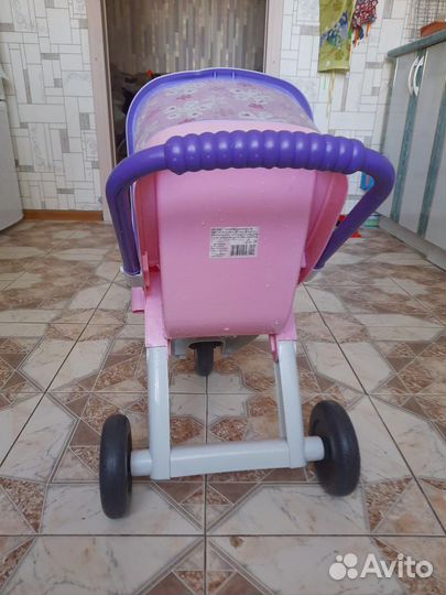 Игрушечная коляска для кукол