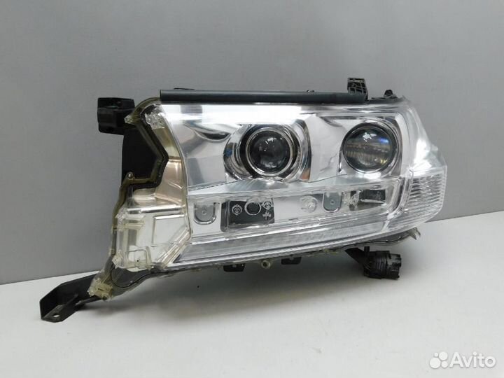 Фара левая Toyota Land Cruiser