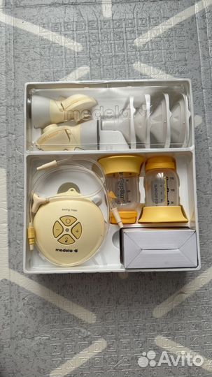 Молокоотсос medela swing maxi flex