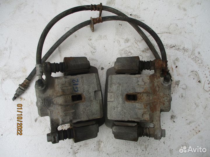 Субару суппорт задний