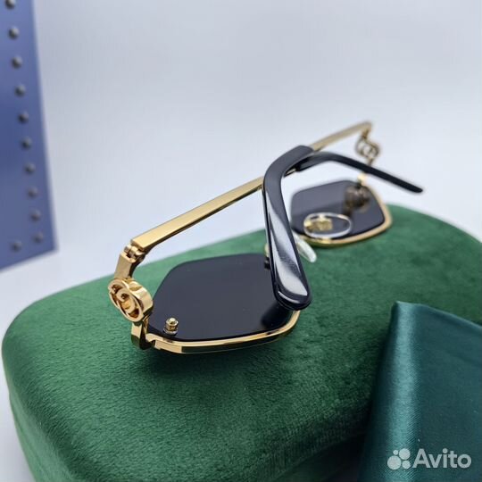 Солнцезащитные очки Gucci GG1604s 001