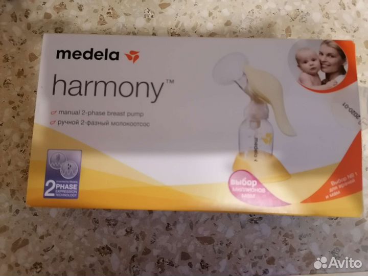 Молокоотсос medela ручной