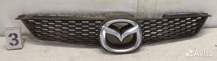 Решетка радиатора Mazda Demio DY 04-07