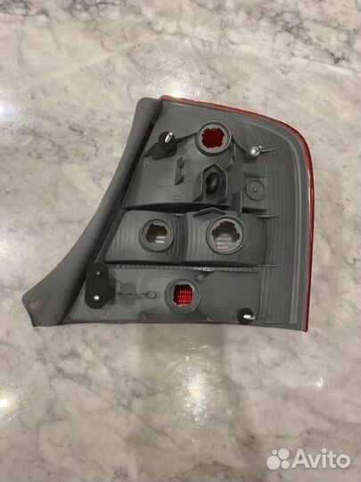 Стоп-сигнал задний левый Mazda Familia BJ