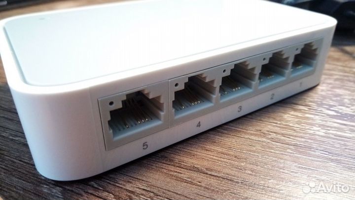 Коммутатор TP-Link TL-SF1005D