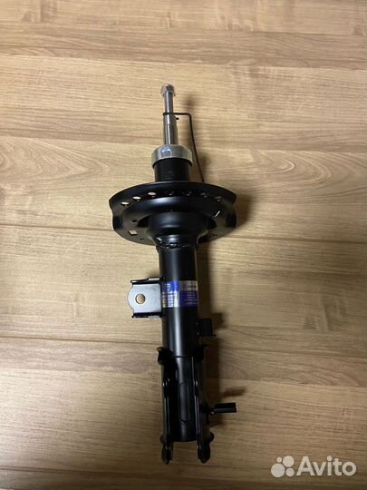 Амортизатор передний левый на Solaris 1 / Rio 3