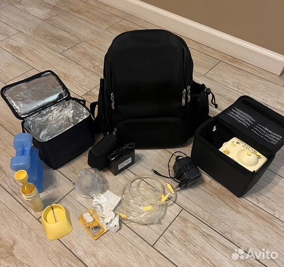 Молокоотсос medela электрический