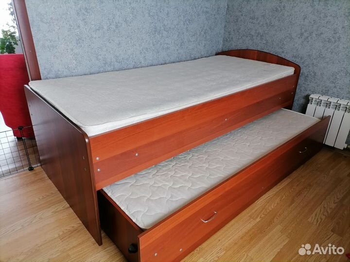 Двухъярусная выкатная кровать