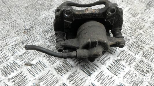 Суппорт тормозной передний правый opel corsa D (83