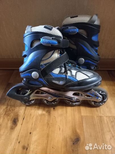 Роликовые коньки