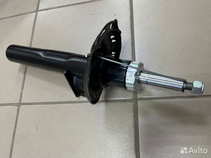 Стойка амортизатора Skoda Octavia A7 перед