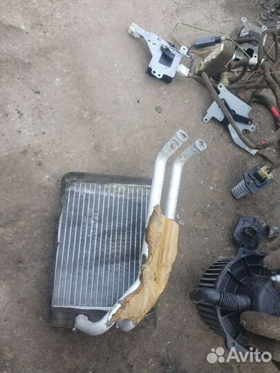 Моторчик отопителя радиатор Hyundai Santa Fe SM 1