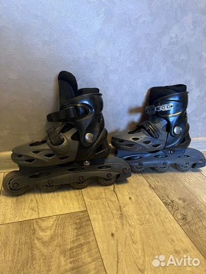 Роликовые коньки