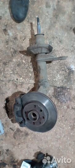 Стойка подвески передняя левая Заз Сенс