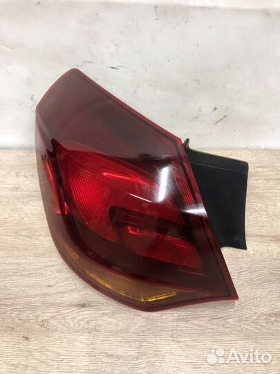 Левый Фонарь в крыло Opel Astra j