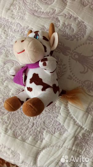 Игрушка веселая коровушка
