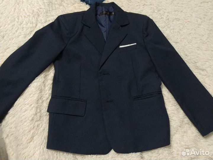 Пиджак тёмно-синий, галстук 8-10лет длина спины от