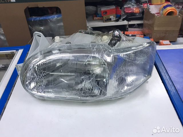 4311126lldem Фара ford Escort 95