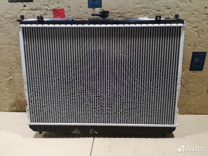 Радиатор двс Kia Carens RS