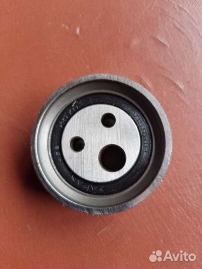 Натяжной ролик ремня грм Рено Логан фаза 1 Koyo