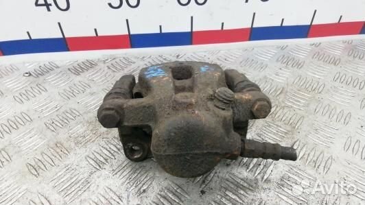 Суппорт тормозной задний левый land rover freeland