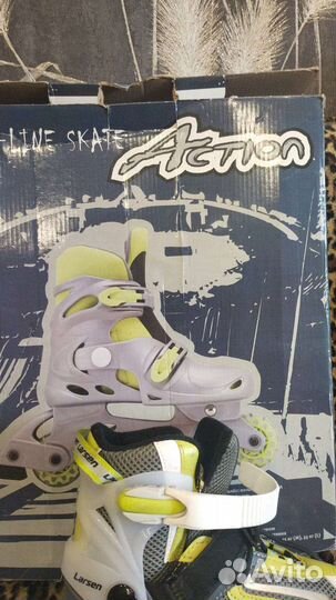 Роликовые коньки