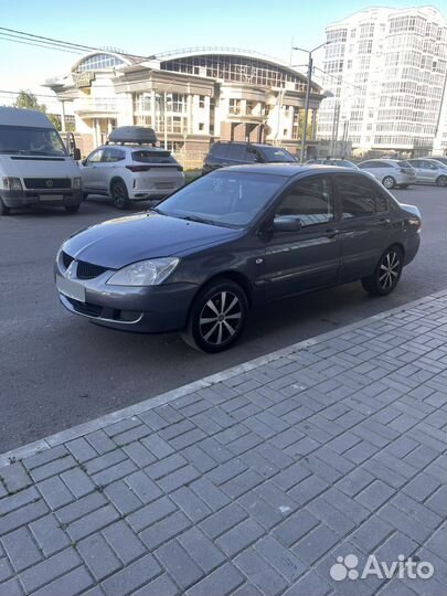 Mitsubishi Lancer 1.6 МТ, 2005, 335 577 км