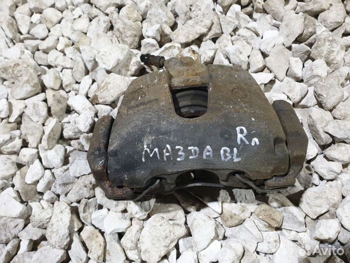 Суппорт передний Mazda 3 BL