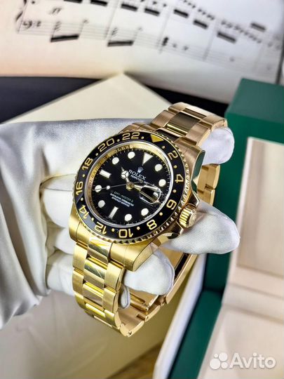 Rolex GMT master II yellow gold with black dial