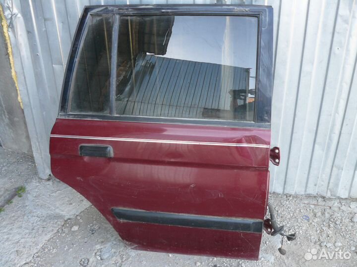Дверь Mitsubishi Pajero Montero Sport Митсубиси