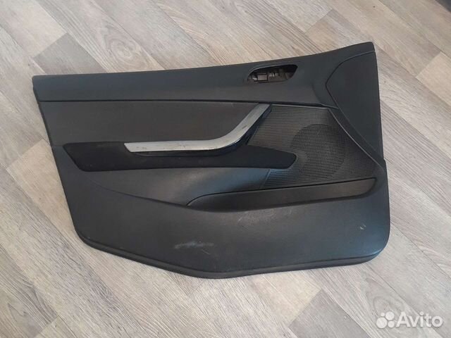 Обшивка двери передняя левая Peugeot 308 2007-2014