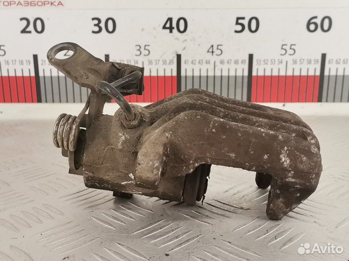 Суппорт задний левый seat Altea 2004 1K0615423J